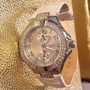 Women’s white guess watch